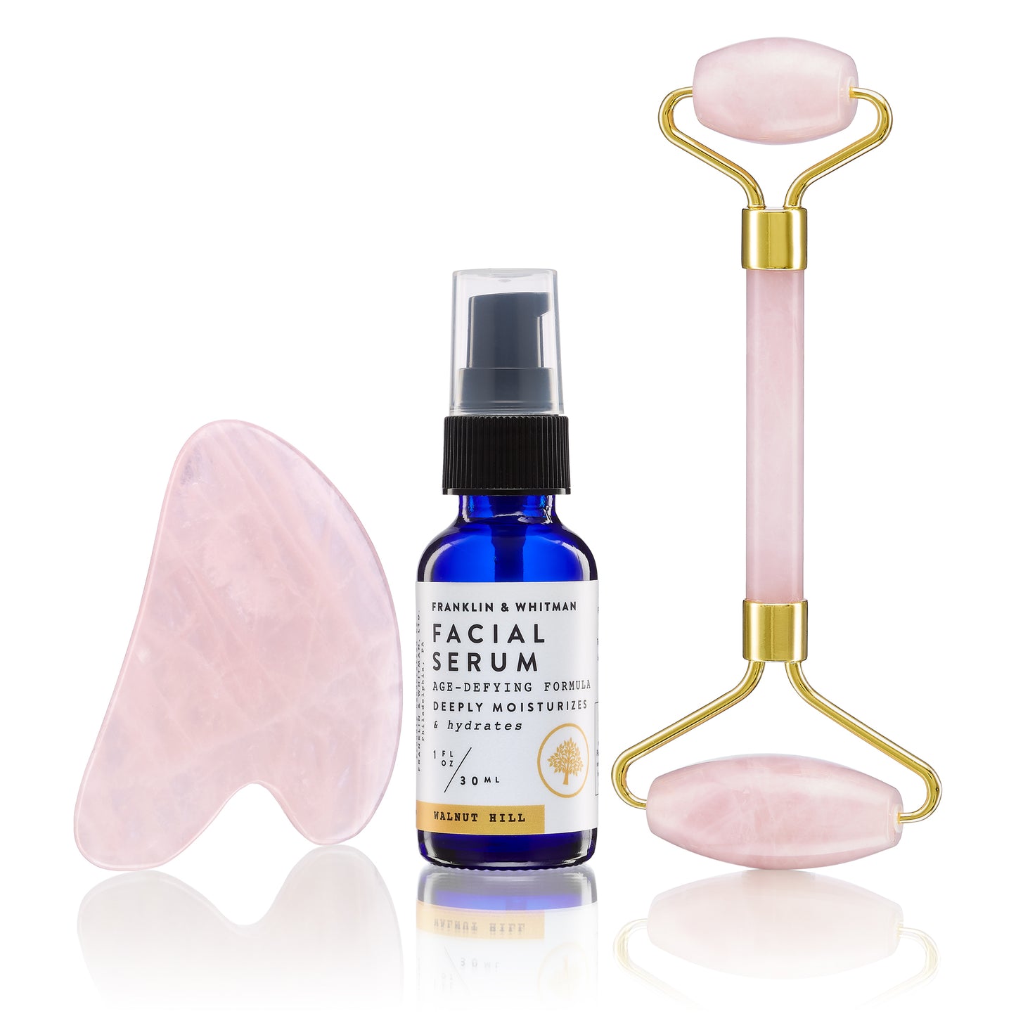 Rose Quartz Gua Sha & Facial Roller with Walnut Hill Face Serum bottle for skincare